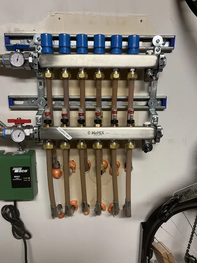 Plumber performing Gas Line Installation at a residential property in Deerfield